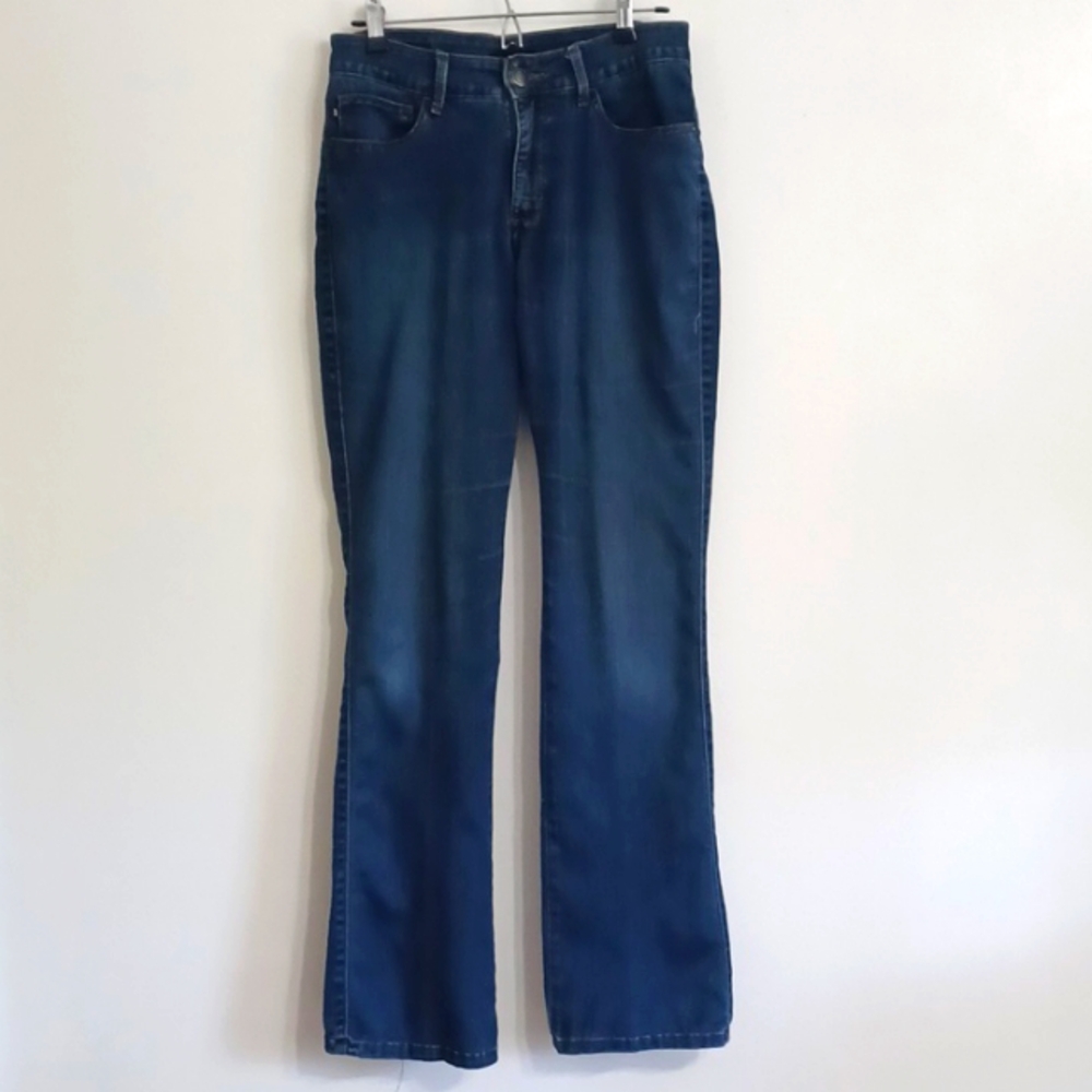 Size 8 faded denim blue jeans.  Distressed.  Casual long blue pants.  Western